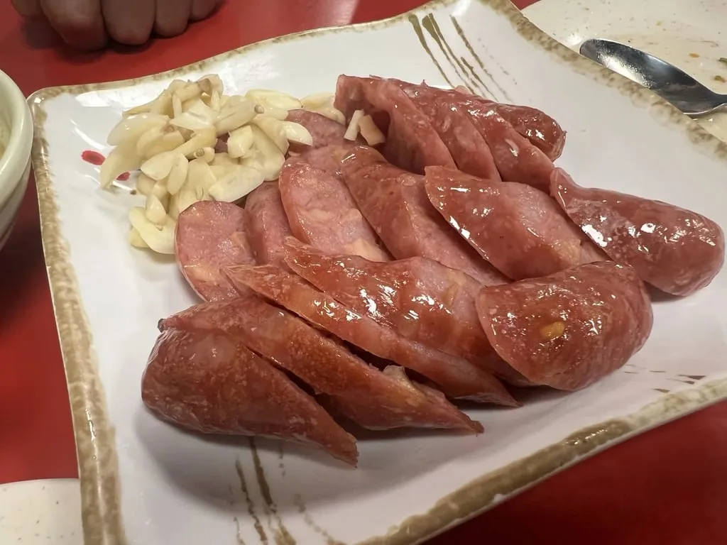 King oyster mushroom sausage sliced with raw garlic A-Cheng Hualien — Taiwan Insider